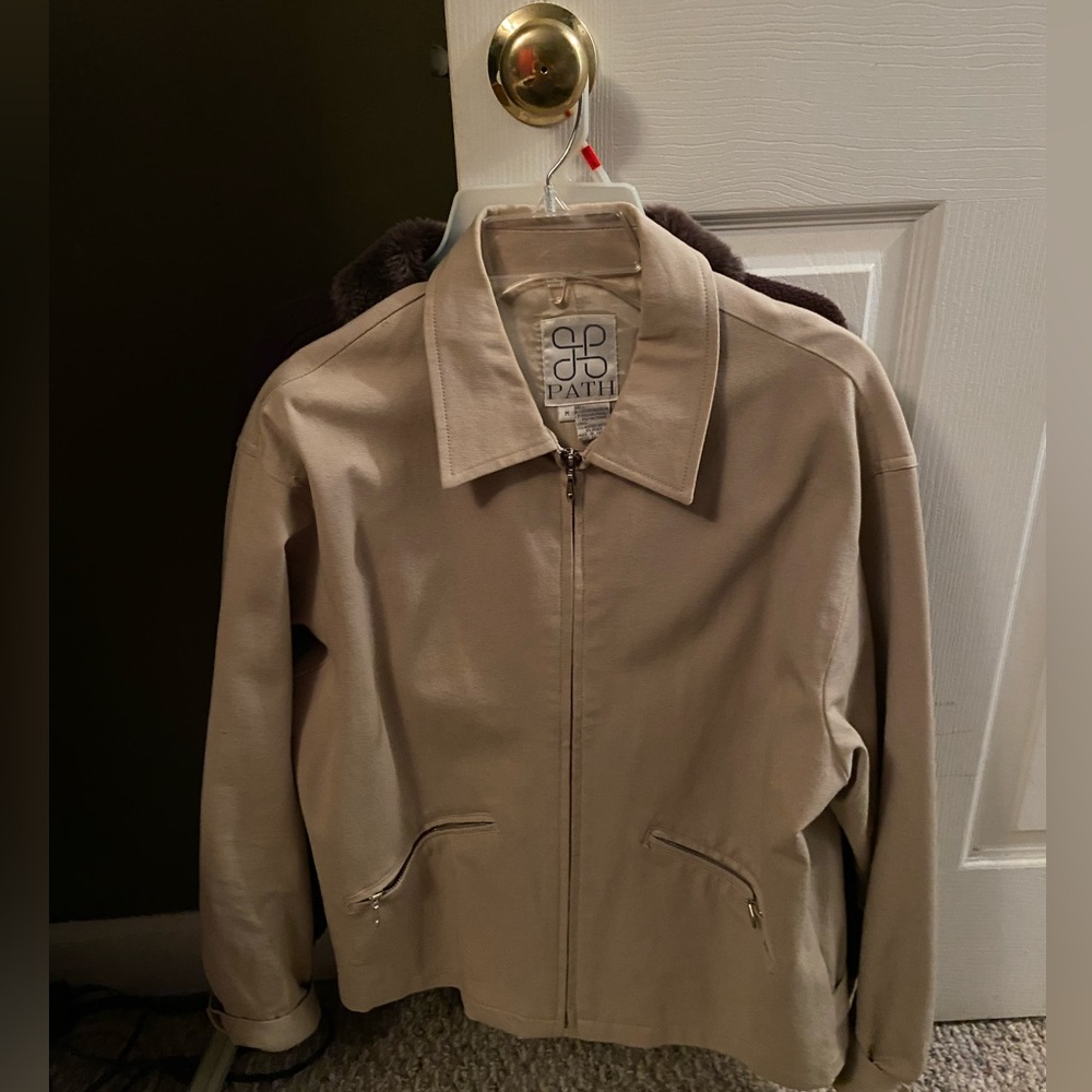Tan zipper jacket. Cute for fall and winter